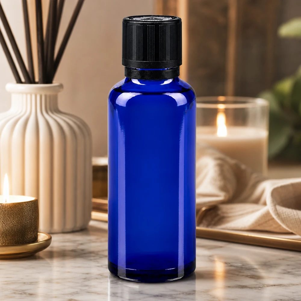 flacon à pharmacie bleu 30ml bouchon inviolable 1mm noir séc. enf. ada.a.ave. bouchon inviolabilité Flacon compte-gouttes bleu de 30 ml en verre de pharmacie, muni d'un bouchon d'origine noir et d'un insert de 1 mm