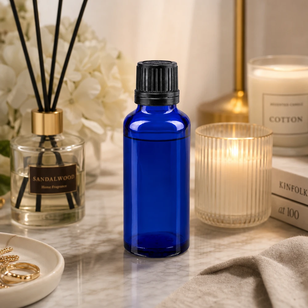Apothekenflasche blau 30ml Schraubverschluss schwarz Giessring Originalitätsverschluss UV-Schutz Glasflasche 30ml kobaltblau mit schwarzem OV-Verschluss für Kosmetik und Pharmazie