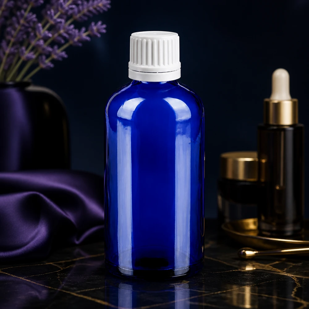 Flacone contagocce da 100 ml 0,7 mm bianco OV BlueLine UT18/100 Flacone contagocce di precisione da 100 ml in vetro blu con protezione UV e tappo bianco per laboratori e farmacie