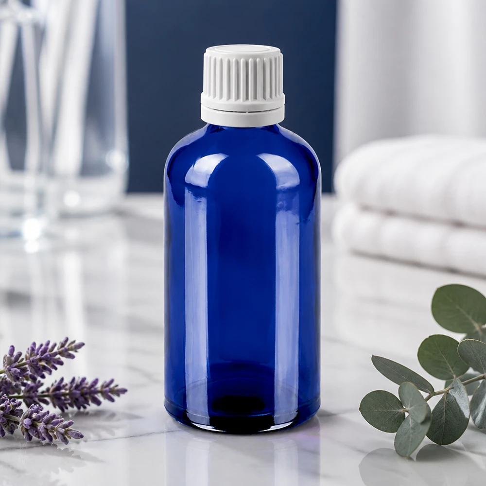 Flacone contagocce di precisione da 100 ml in robusto vetro blu con tappo bianco a prova di bambino