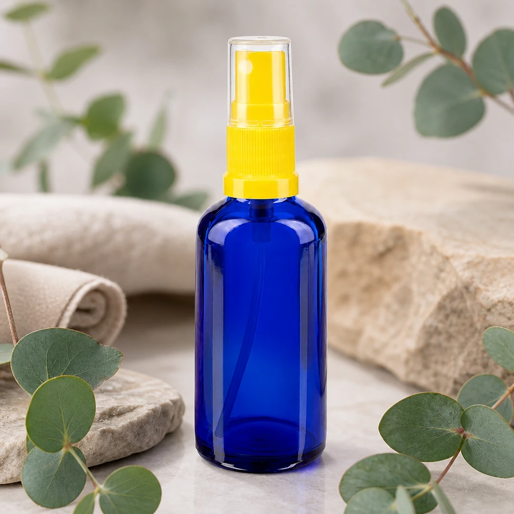 Apothekenflasche blau 50ml Sprayaufsatz gelb Nachfüllbare 50ml Blauglasflasche mit gelbem Feinzerstäuber für ätherische Öle