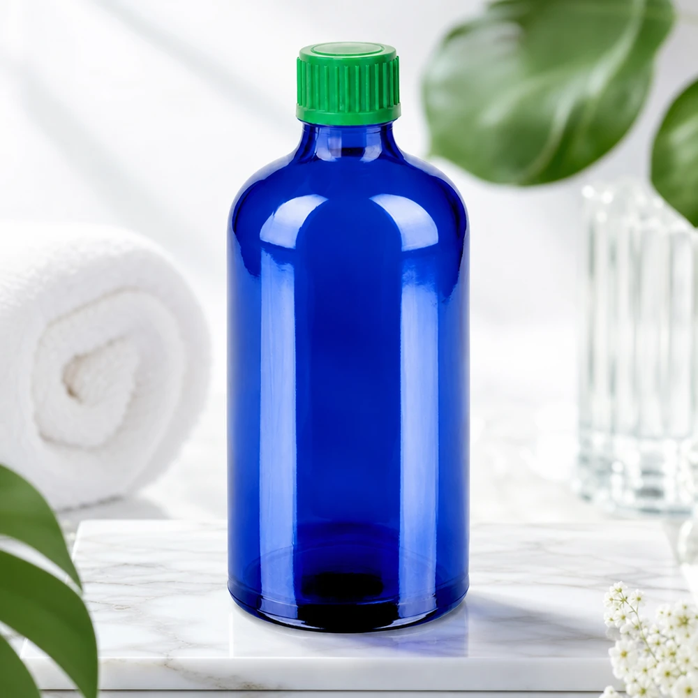 100ml Tropfflasche 0.8mm grünStandardverschluss BlueLine UT18/100 Robuste Tropfflasche 100ml mit mattiertem blauen Glas und grünem Standardgewinde UT18 Verschluss