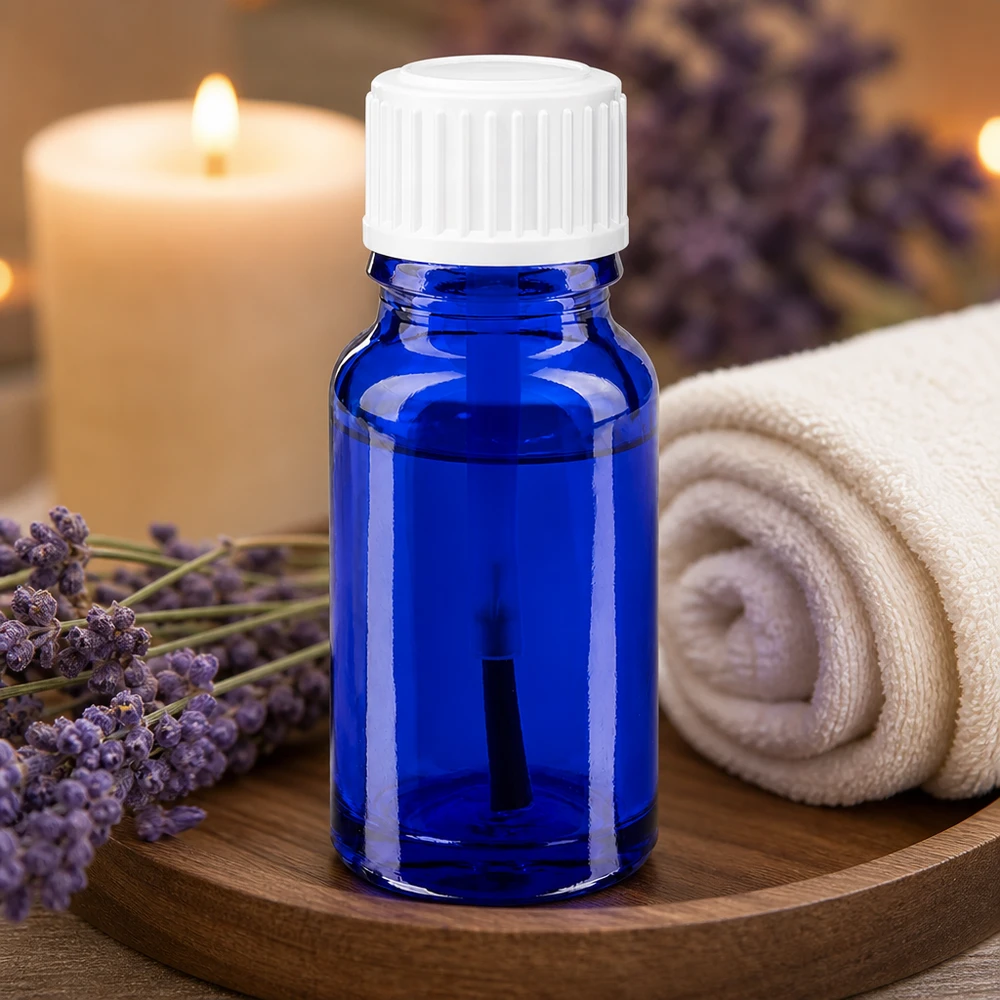 Handliche 10ml blaue Glasflasche mit weißem Applikatorverschluss für Öle und Essenzen