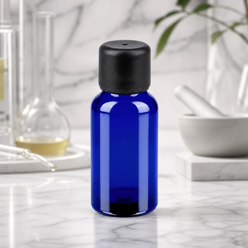 Flacone in vetro da 20 ml di colore blu intenso con tappo da 6 mm per una protezione ottimale dagli effetti della luce.