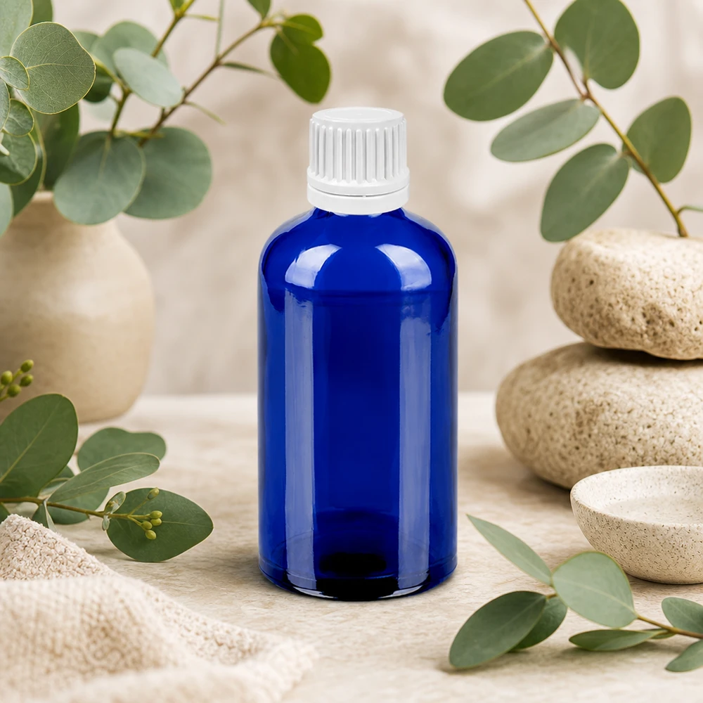Flacone contagocce da 100 ml 0,7 mm bianco OV BlueLine UT18/100 Elegante flacone in vetro blu da 100 ml con tappo contagocce bianco - ideale per la cosmesi e la cura della pelle fai da te