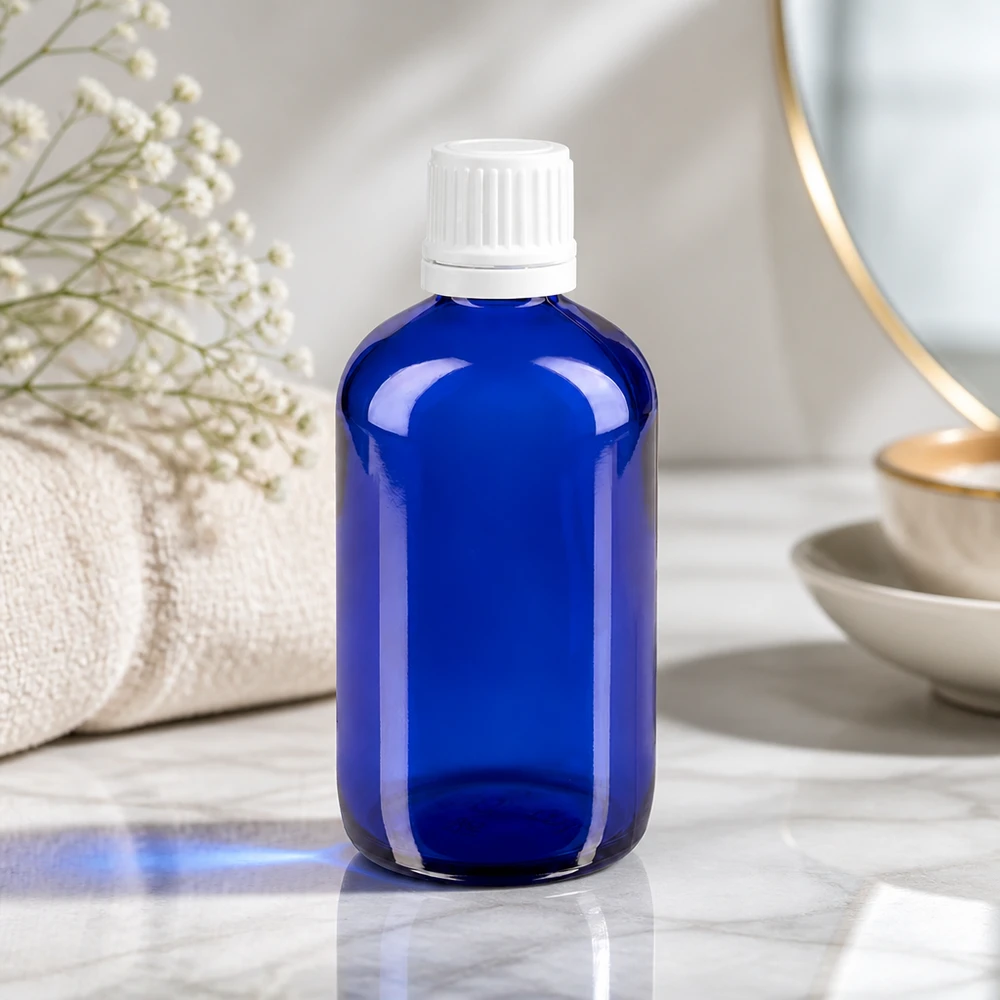 Apothekenflasche blau 100ml Schraubverschluss weiß Originalitätsverschluss Leere blaue Apothekerflasche aus Glas 100ml mit weißem Sicherheitsdeckel für ätherische Öle