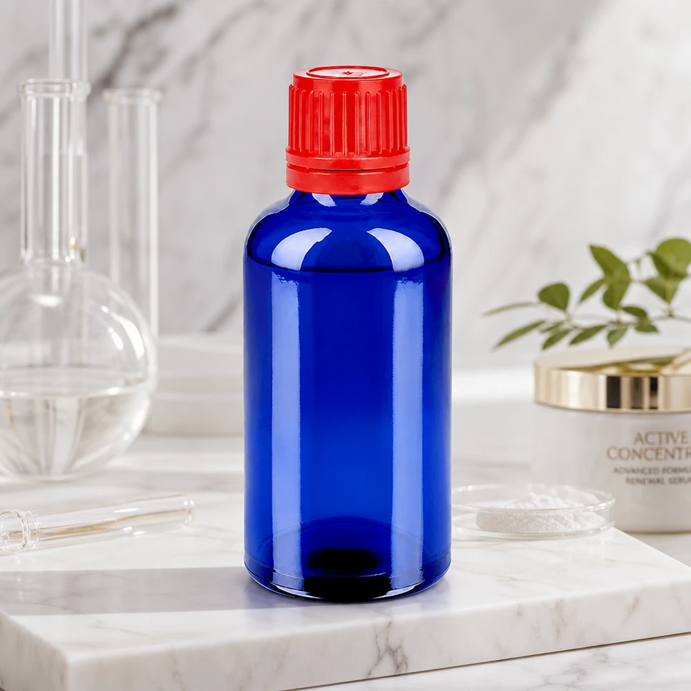 50ml Flasche 11mm Schraubverschluss rot Originalitätsverschluss BlueLine UT18/50 50ml Flasche mit lichtschützender blauer Glasoberfläche und rotem SV Verschluss 11mm OV BlueLine UT18/50