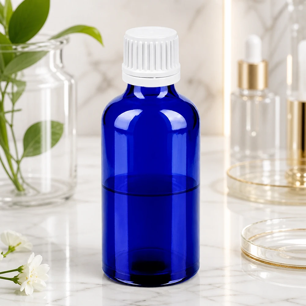 Bottiglia in vetro premium da 50 ml con superficie opaca e design ergonomico in blu profondo