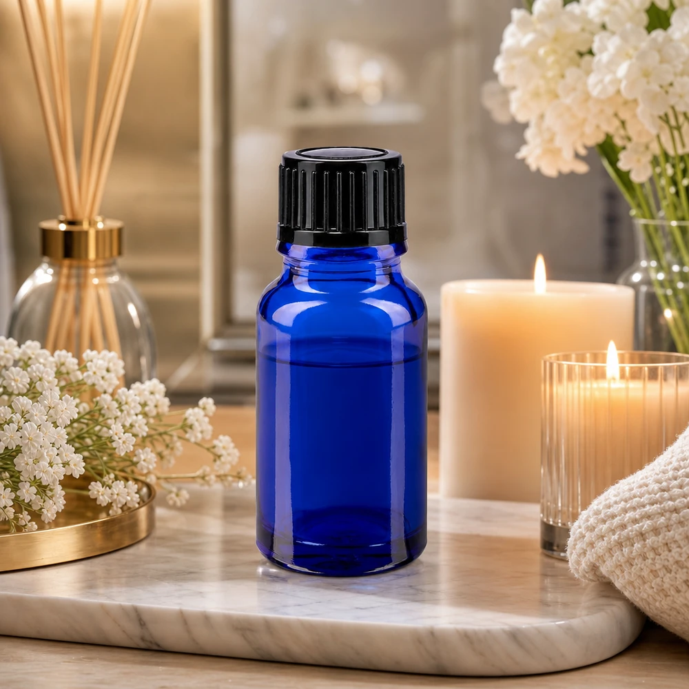 Blaue Miniaturflasche aus Apothekerglas 10ml mit dosierpräzisem Tropfverschluss