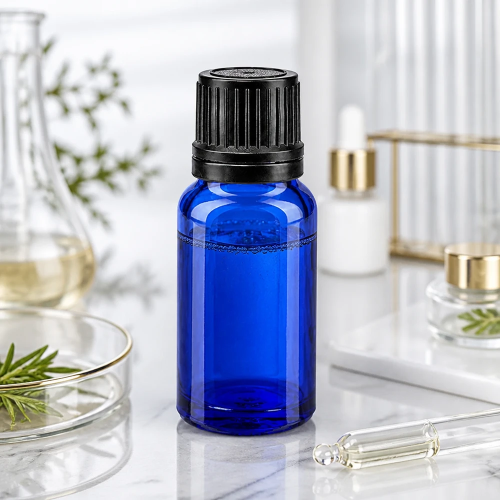 Apothekenflasche blau 10ml Tropfverschluss Giessring 1mm schwarz Originalitätsverschluss 10ml Dosierflasche Kobaltblau mit schwarzem OV-Verschluss und 1mm Öffnung aus Apothekenglas