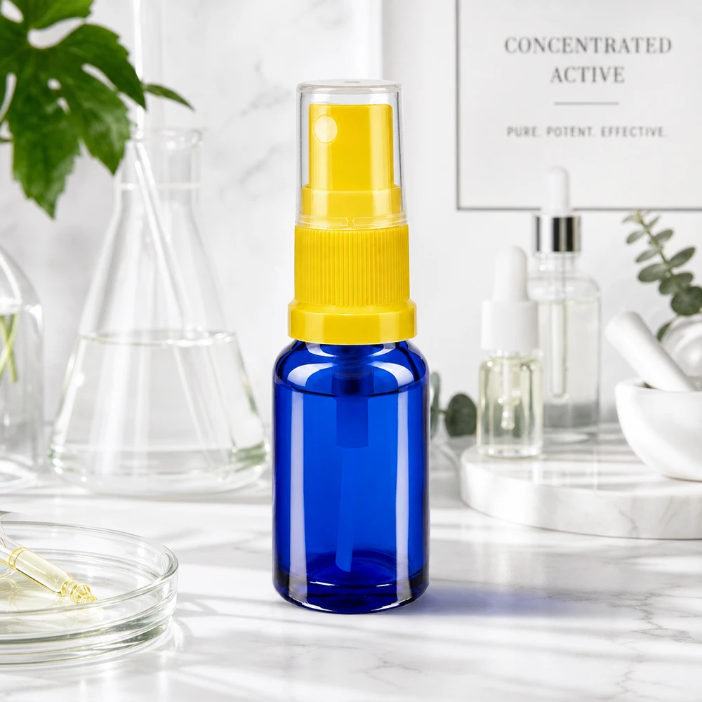 Apothekenflasche blau 10ml Sprayaufsatz gelb Blaue Zerstäuberflasche 10ml STD Serie mit gelbem Sprühaufsatz und kindersicherer Schutzkappe