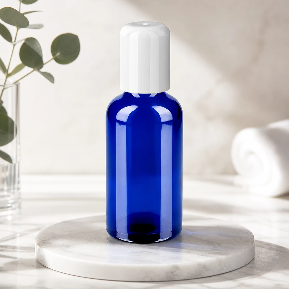 50ml Roll-On Flasche weiß Standardverschluss BlueLine UT18/50 Handliche 50ml Roll-On Flasche UT18/50 aus temperaturbeständigem blauem Spezialglas
