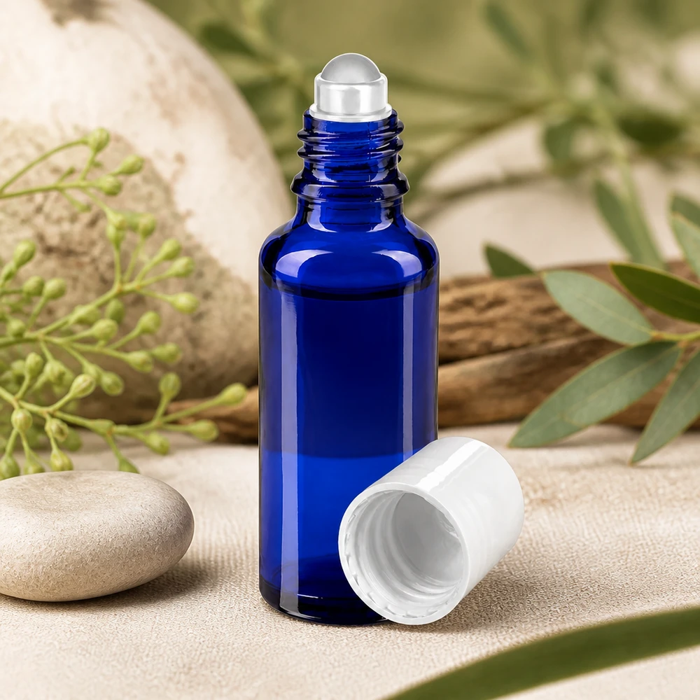 Bottiglia roll-on 30ml blu STD bianco ApoGlas Flacone in vetro da farmacia blu da 30 ml con roll-on in acciaio inossidabile e tappo a vite bianco su base in pietra naturale