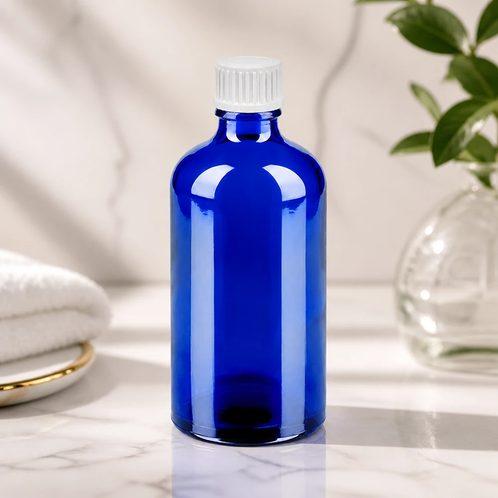 100ml Tropfflasche 0.9mm weiß Standardverschluss BlueLine UT18/100 Professionelle Tropfflasche BlueLine UT18/100 aus blauem Glas mit weißem Standardgewinde