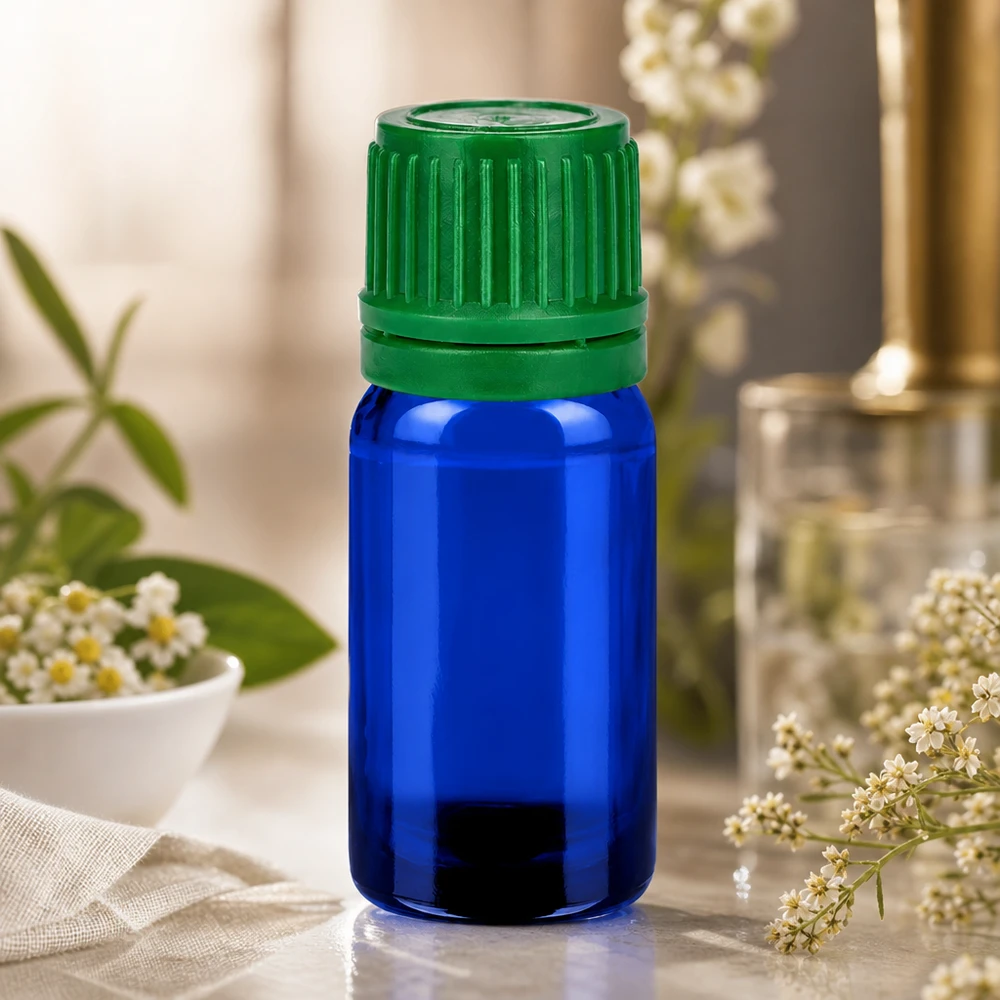 Bottiglia BlueLine da 5 ml con beccuccio di versamento preciso e sistema di chiusura ermetica verde.