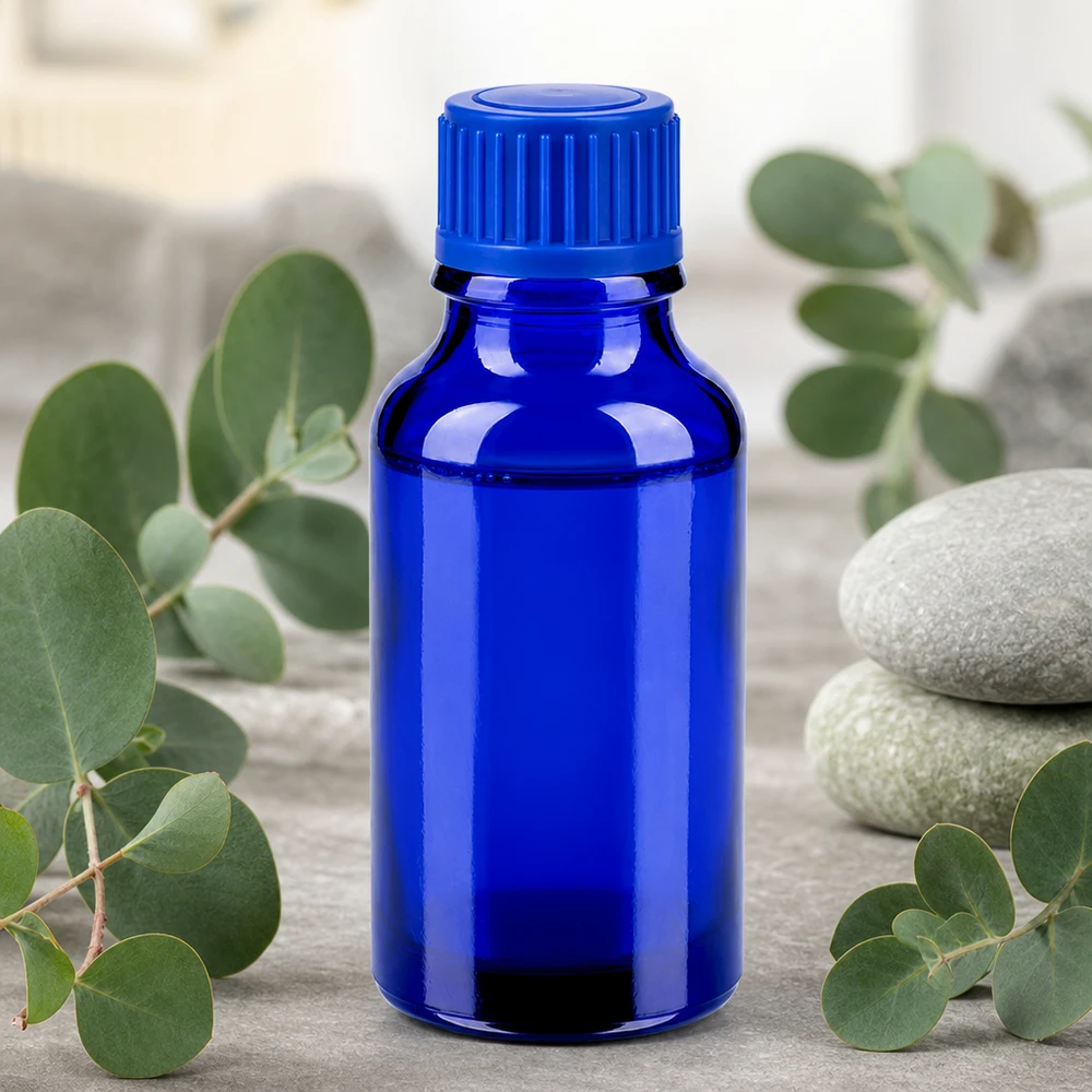 Flacone da 20 ml in vetro blu con protezione UV e tappo a vite scanalato.