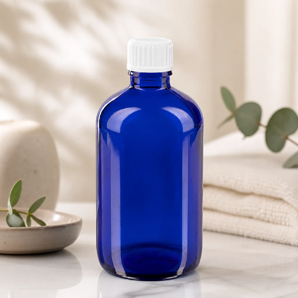 Flacon de pharmacie bleu 100ml bouchon compte-gouttes blanc 0.8mm Std Flacon compte-gouttes bleu cobalt de 100 ml avec bouchon à vis en plastique blanc à sécurité enfants