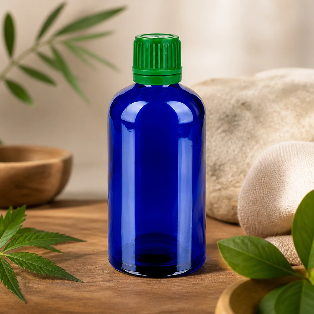 100ml Flasche 11mm Schraubverschluss grün Originalitätsverschluss BlueLine UT18/100 Kompakte 100ml blaue Glasflasche mit kindersicherem grünem Verschluss für sichere Aufbewahrung