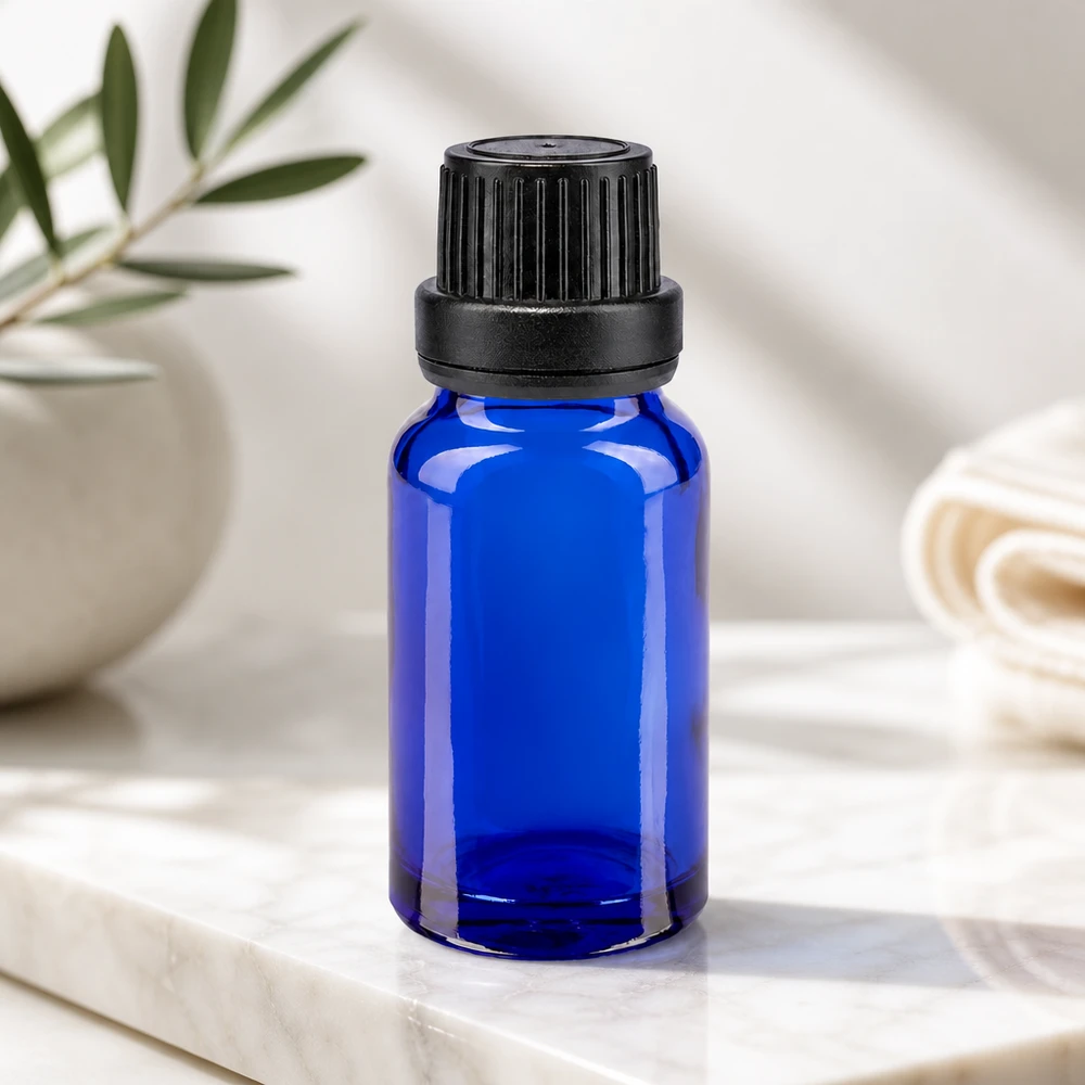 Apothekenflasche blau 10ml Tropfverschluss Giessring 2mm schwarz Originalitätsverschluss Kompakte blaue Glasflasche 10ml mit geripptem Schwarzverschluss und 2mm Einsatz für Serum und Essenzen
