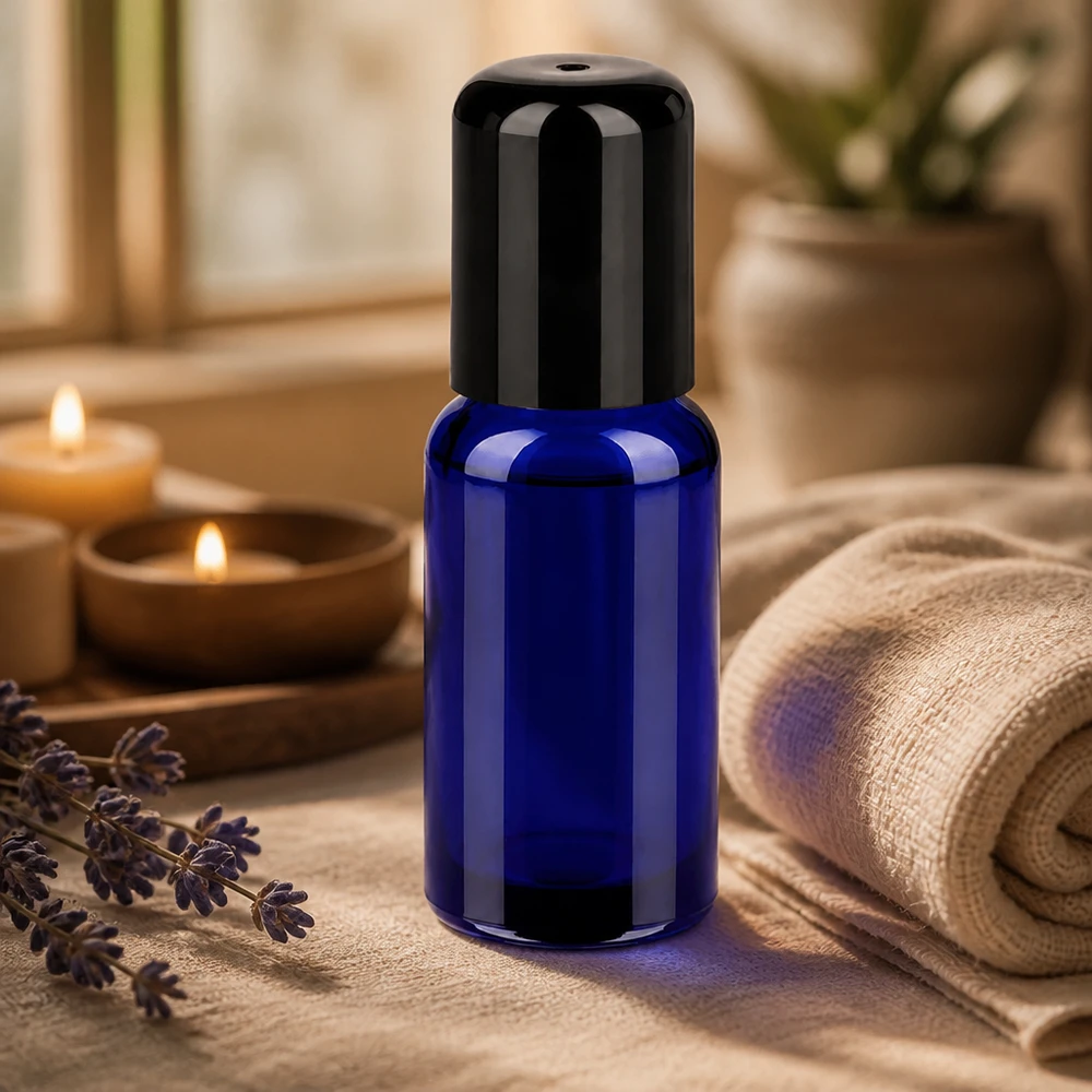 Elegante flacone in vetro blu cobalto da 20 ml con applicatore roll-on preciso per applicazioni spot