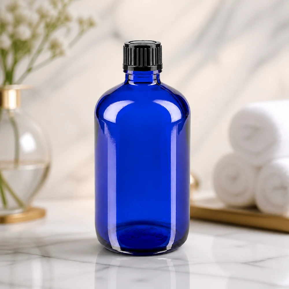 Apothekenflasche blau 100ml Schraubverschluss schwarz Standard Robuste Apothekerflasche in Kobaltblau 100ml mit kindersicherem schwarzem Schraubverschluss 11mm