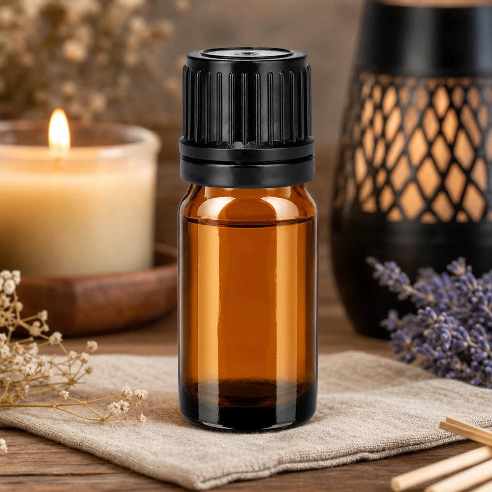 Flacone compatto da 5 ml in vetro ambrato protetto dai raggi UV, ideale per l'aromaterapia e il benessere