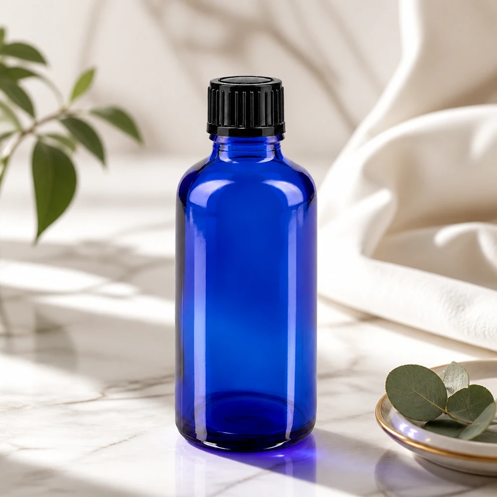 Apothekenflasche blau 50ml Schraubverschluss schwarz Standard Lichtschutzflasche 50ml in Blauglas mit schwarzem Kunststoffverschluss für Aromatherapie