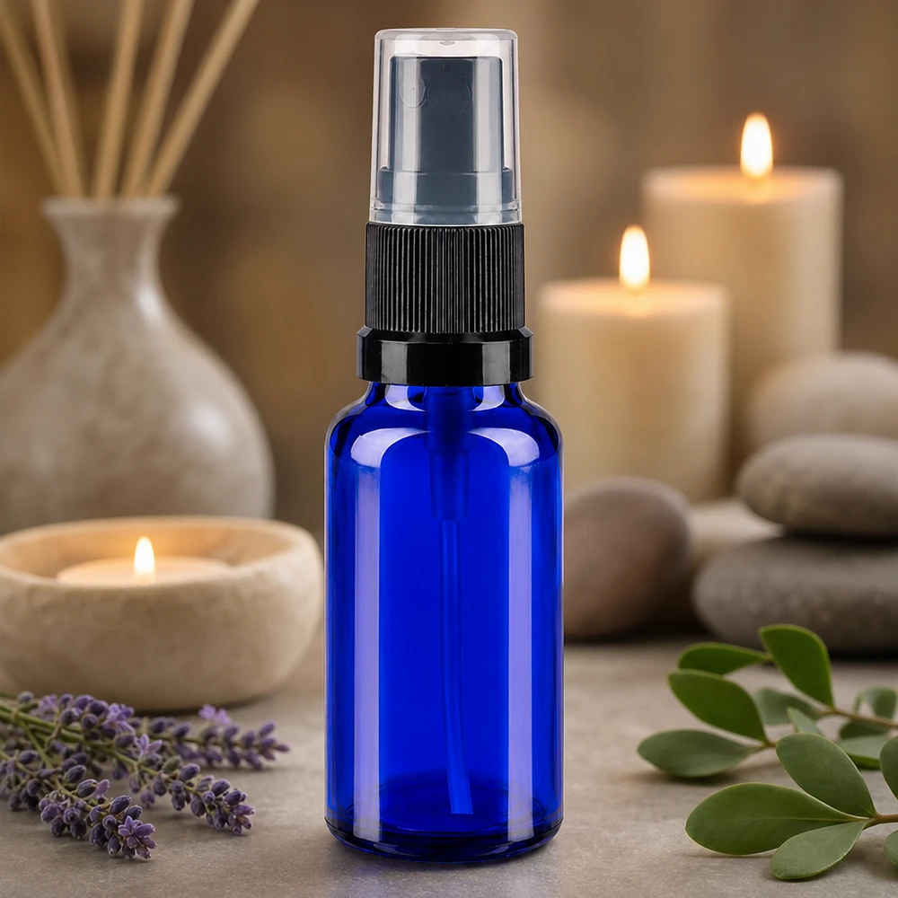 Apothekenflasche blau 20ml Sprayaufsatz schwarz Nachfüllbare 20ml Sprühflasche aus blauem Schutzglas mit Feinstzerst für Kosmetikanwendungen