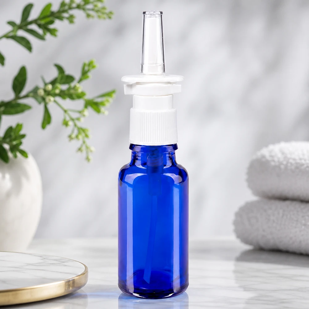 Pharmazeutische 20ml Nasensprayflasche blau mit kindersicherem weißen Pumpverschluss aus Glas