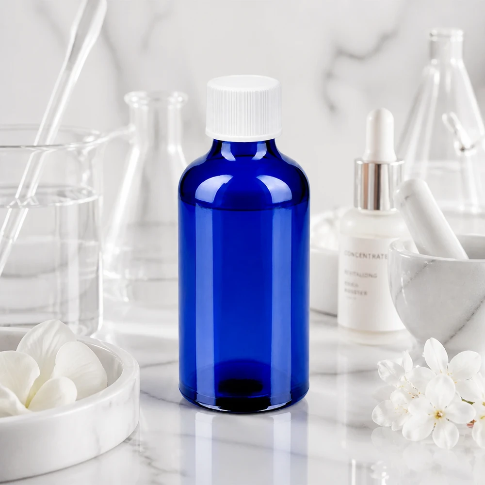 Pratico flacone contagocce da 50 ml in robusto vetro blu per un dosaggio preciso