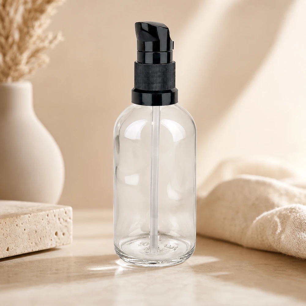 Flacone a pompa da 100 ml nero STD ClearLine UT18/100 Flacone in vetro trasparente vuoto da 100 ml con pompa dosatrice nera ClearLine UT18, flacone cosmetico riutilizzabile