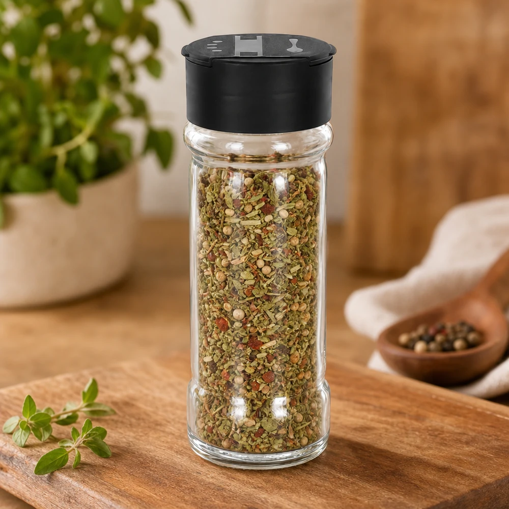 Pot à sel/épices 100 ml avec double saupoudreuse, noir Rundes Gewürzglas 100ml mit grünen Kräutern und roten Flocken befüllt schwarzer Deckel