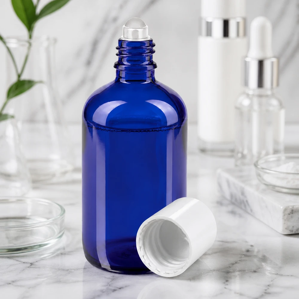 Apothekenflasche blau 100ml Roll-On Verschluss weiß Hochwertige 100ml blaue Glasflasche mit Rollapplikator für ätherische Öle