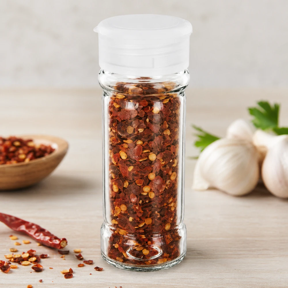 Pot à sel/épices 100 ml avec saupoudreuse, blanc Transparentes Glasgewürzbehälter 100ml mit weißem Streuerdeckel auf hellem Holzuntergrund