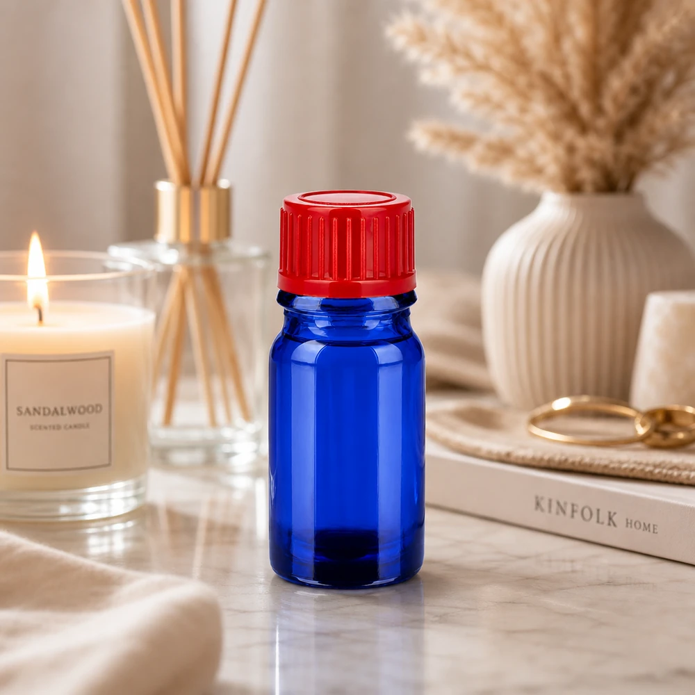 Flacone da 5 ml in vetro blu con tappo a vite rosso ergonomico per una facile manipolazione