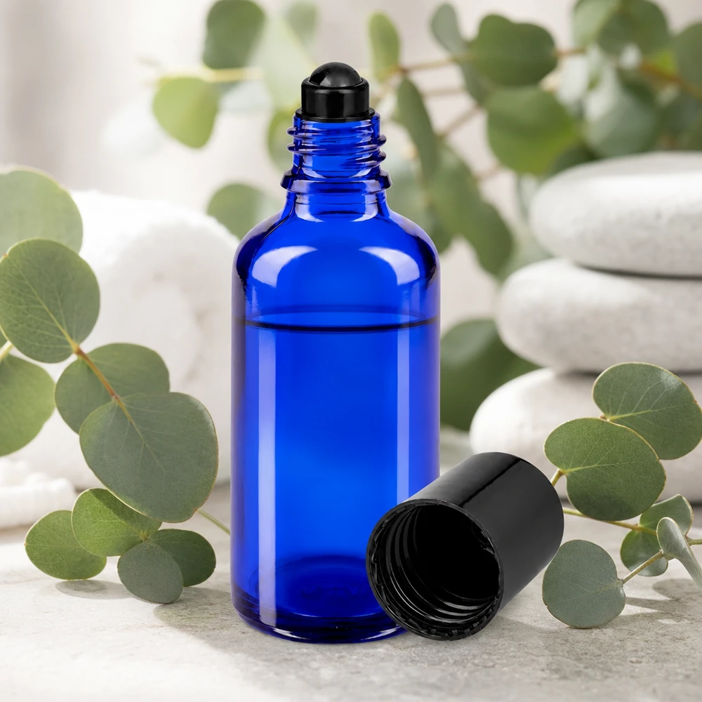 Zylindrische blaue 50ml Roll-On Glasflasche mit mattem Schwarzdeckel für Naturkosmetik