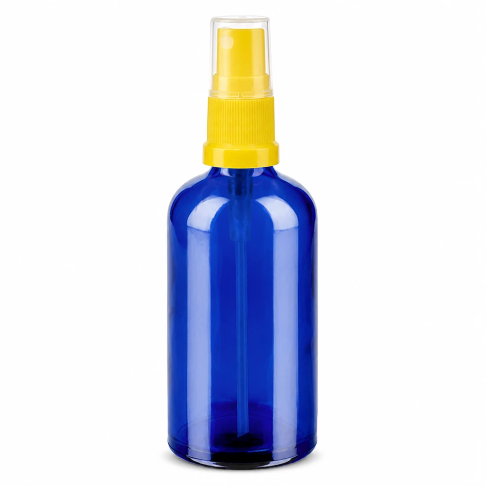 Vaporisateur 100ml jaune/tr. STD BlueLine UT18/100 Flacon en verre bleu de 100 ml avec tête de pulvérisation jaune pour la cosmétique et l'aromathérapie
