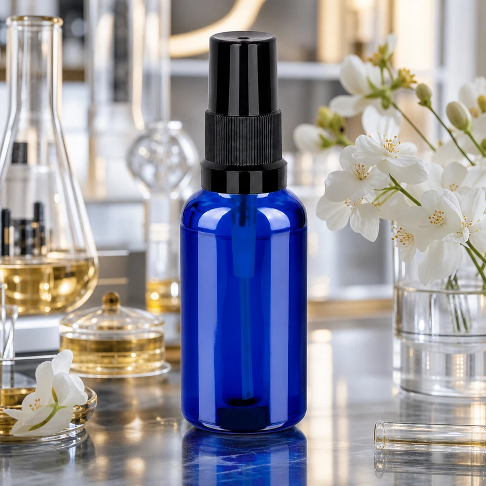 Flacone in vetro blu da 30 ml con testina di spruzzatura precisa per l'applicazione dosata di liquidi