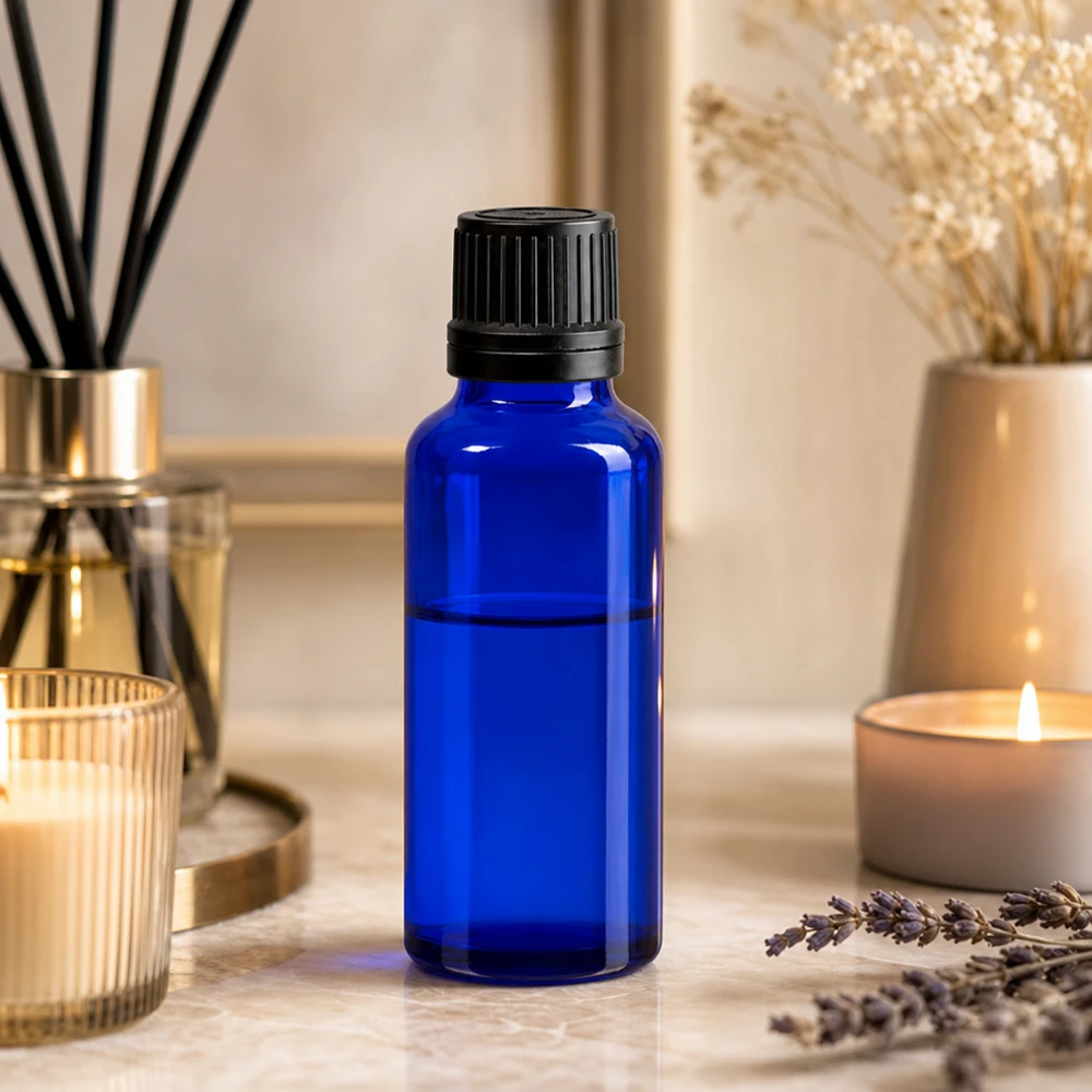 Flacon de pharmacie bleu 30ml bouchon compte-gouttes 1mm noir bouchon inviolabilité Flacon compte-gouttes pour aromathérapie de 30 ml en verre de protection bleu cobalt avec bouchon OV noir