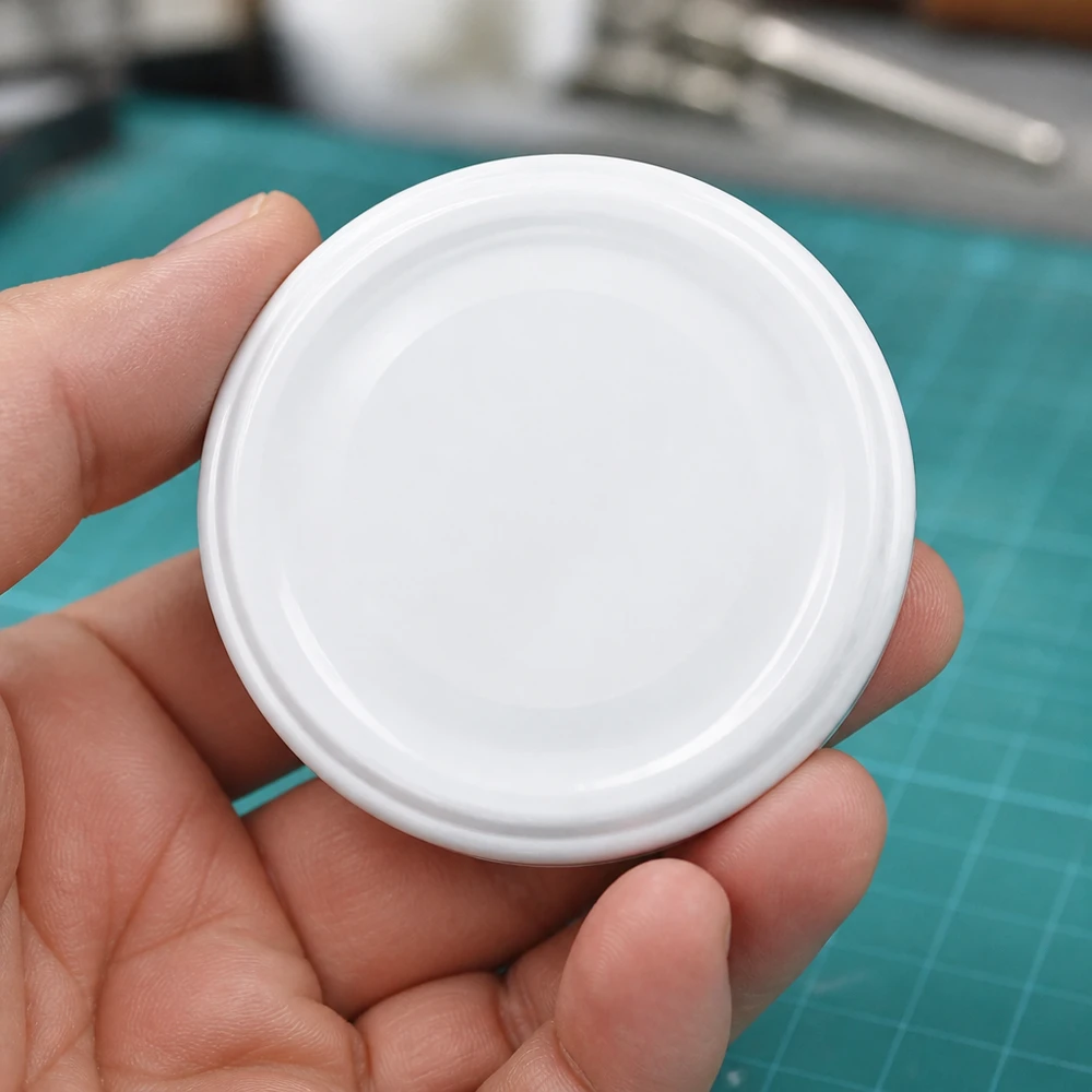 UNiTWIST TO43 43mm Twist-Off Deckel weiss BioSeal Nahaufnahme Oberseite glatte Oberfläche